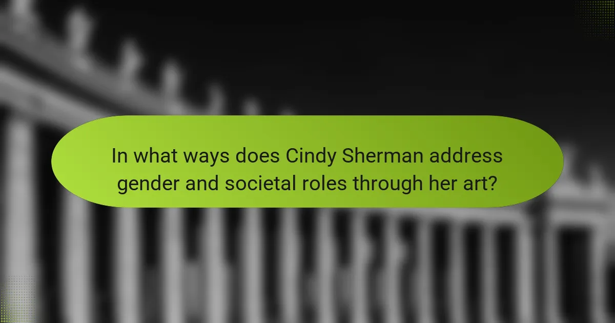 In what ways does Cindy Sherman address gender and societal roles through her art?